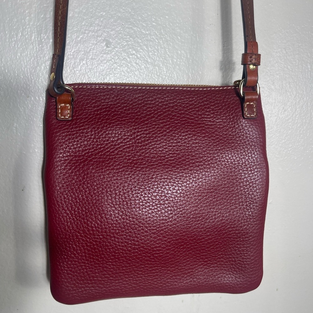 Dooney Bourke  burgundy  grain North South Triple Zip Crossbody (gently loved) - Picture 5 of 8